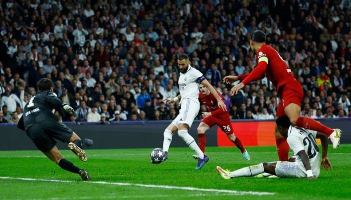 Hasil pertandingan Real Madrid vs Liverpool, Madrid berhasil lolos ke babak perempat final Liga Champions 2022/2023 usai mengalahkan Liverpool dengan skor agregat 6-2. (reuters)